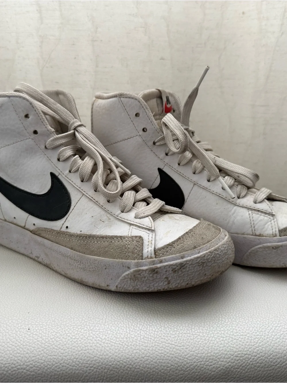 Nike Men’s White High-Top Sneakers with Black Swoosh and Red Tongue Logo